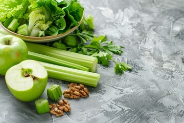 Fresh Waldorf salad with green apples walnuts celery on stone background
