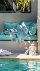 Arranges a quiet reading nook by the pool, with aquacolored cushions and soft throws, making it the perfect spot for relaxation and solitude