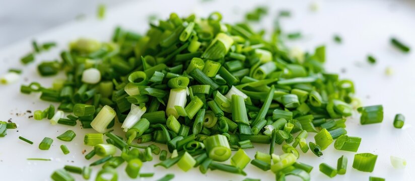 Chopped green onions on a white background.