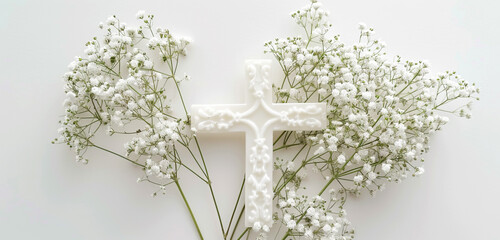 A graceful white cross intertwined with delicate baby's breath flowers, evoking a sense of purity and innocence against a pristine white background