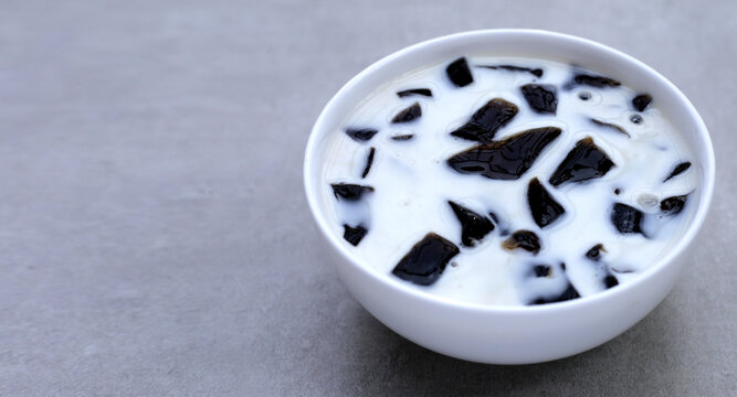 Grass jelly in milk, herbal dessert. Mesona chinensis