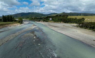 Waiapu River and farmland in Ruatoria, Gisborne, New Zealand.