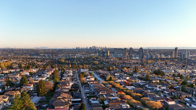 Beautiful sunset over the skyline of Burnaby in the Lower Mainland during a spring season in British Columbia, Canada