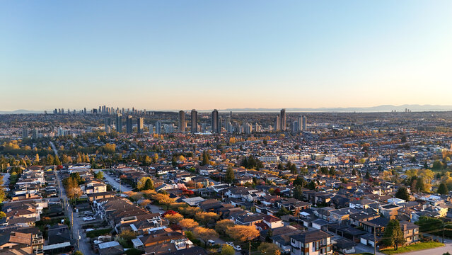 Beautiful sunset over the skyline of Burnaby in the Lower Mainland during a spring season in British Columbia, Canada