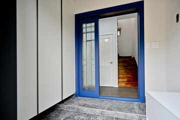 Sliding or folding doors are generally installed in the entrance