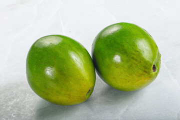 Two ripe green exotic avocado fruit