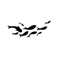 silhouette of swimming fish