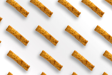 Fried snack placed diagonally on a white background.