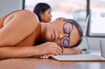 Woman, sleeping and tired at desk in office with notebook for creativity, ideas and fatigue at...