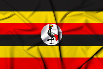 Beautifully waving and striped Uganda flag, flag background texture with vibrant colors and fabric...