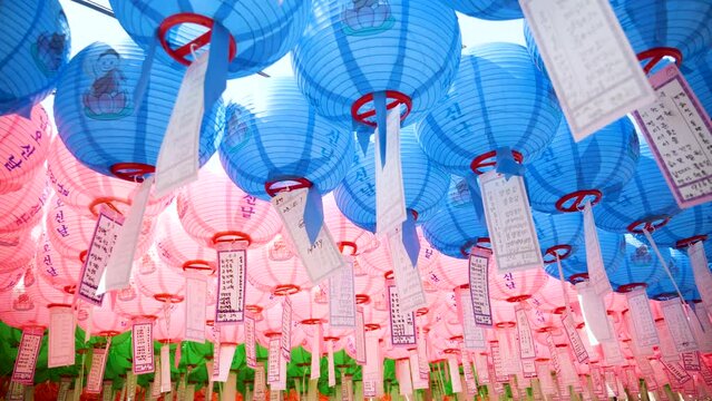 Celebrating Buddha's Birthday in Bulguksa temple in Gyeongju, South Korea. Colored paper lanterns celebrate Siddhartha Gautama Birthday. UNESCO World Heritage site. High quality 4k footage.