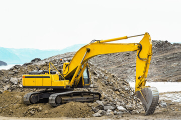 excavator. construction equipment, such as loaders or excavators