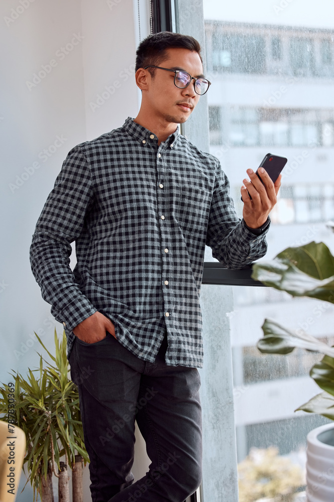 Poster man, phone and window in office for reading notification, email and deal from contact at startup. bu