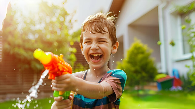 boy with a water gun in the courtyard, grass, happy expression, very happy, realistic style, real, UHD image, happy facial expression