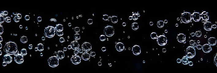 The movement of air in the water. Macro. Black and white. For eco concepts or drinks, liquids with bubbles, abstract backgrounds.