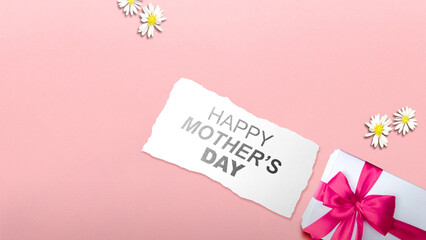 Paper with Happy Mother's Day text and a gift box - obrazy, fototapety, plakaty