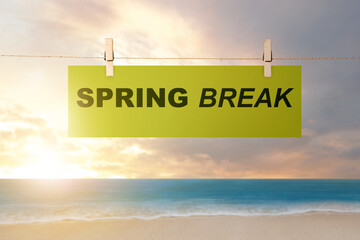 Paper hanging on the rope with Spring Break text