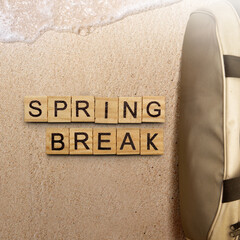 Bag and wooden cubes with Spring Break text