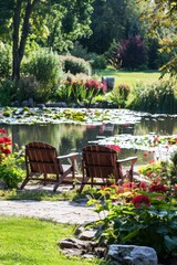 Two Lawn Chairs by Pond