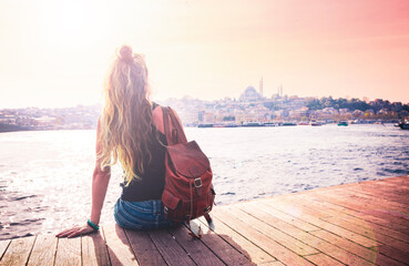 Young woman traveling in Turkey- Female tourist enjoying view of Istanbul