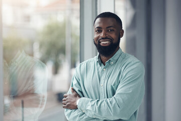 Portrait, business and black man with arms crossed, window and corporate goals with professional and smile. Face, African person and happy employee with career ambition and startup with confidence