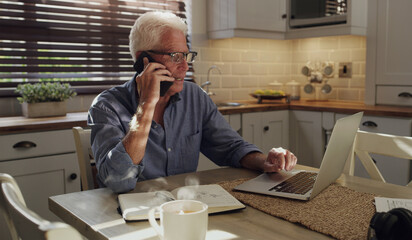 Laptop, phone call and mature man in home with customer service consultation for online crm....