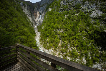 Boka waterfall in Slovenia, near Bovec. Easy trekking nature trail in the forest with the view of...