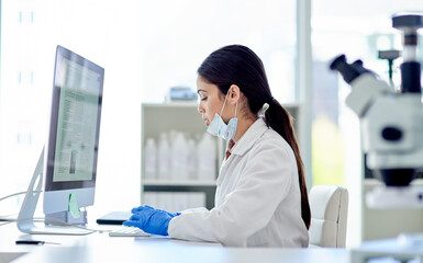 Science, research and woman with computer typing medical study, online report or exam results. Website, writing and review for scientist, lab technician or notes for pharmaceutical test in laboratory