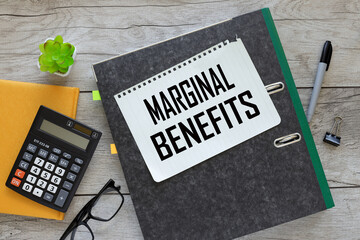 MARGINAL BENEFITS text on a torn page on a gray folder