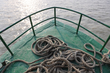 Rope lying on a boat's deck.this photo was taken from Bnagladesh.