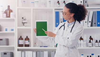 Woman, doctor and tablet with green screen in lab for mockup, pointing and telehealth. Tech, female...