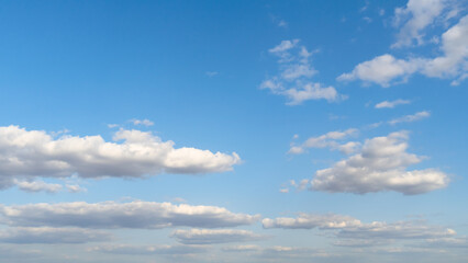 beautiful blue sky with white cumulus clouds for abstract background