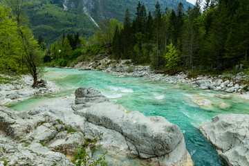 Soča, Bovec, Slovenia. Valley with rapid rivers surrounded by woods. Tibetan wooden bridges. Area...