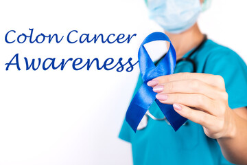 Dark blue ribbon. Colon cancer awareness. healthcare and medicine concept.