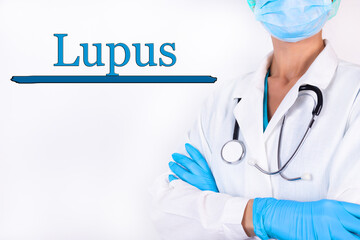 Doctor in medical clothes on a light background with the text Lupus. Medical concept.