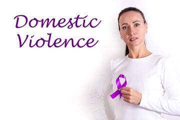 Woman with purple ribbon on a white background, closeup. Symbol of Domestic Violence Awareness