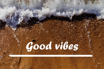 Inspirational Quote - Good vibes on a stone background