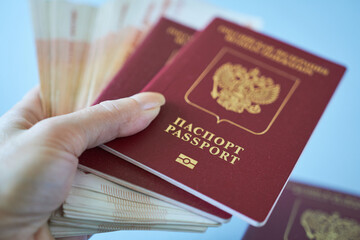 passport and money in the hands of a citizen of the Russian Federation