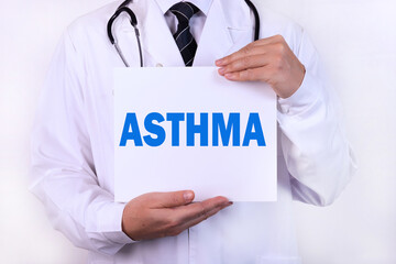 Doctor holding a card with Asthma medical concept.