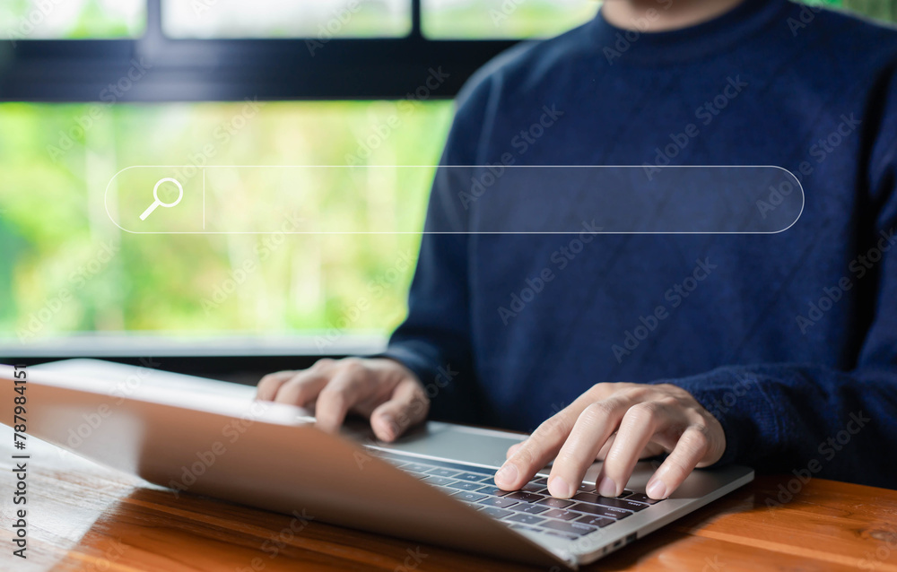 Poster man using a laptop shows a search bar. concept of web browser information, keyword search engines, s