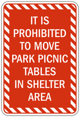 Picnic area sign it is prohibited to move park picnic tables in shelter area