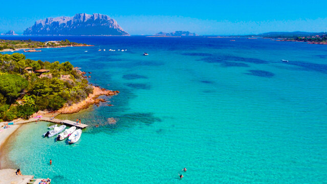 Aerial view of beach and turquoise sea, Porto Istana, Costa Corallina, Sardinia, Italy