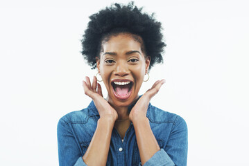 Black woman, portrait and excited with afro for winning, good news or prize on a white studio...