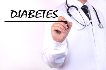 Doctor writing word DIABETES with marker, Medical concept.