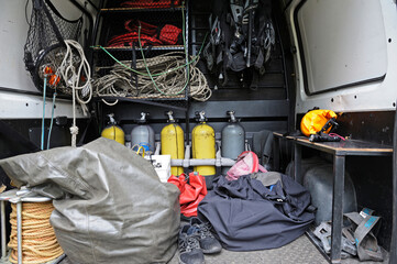 Rescue mobile post with a diving equipment set: balloons, wetsuits, buoys, bags
