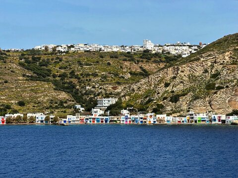 Traditional colourful Cycladic houses along coastline, Klima, Milos, Cyclades, Greece