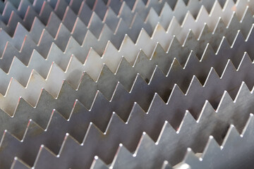Metal elements in the form of triangles close-up