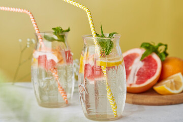 Vitaminized healthy detox water. Refreshing summer cocktails with citrus fruits. Low alcohol, zero...