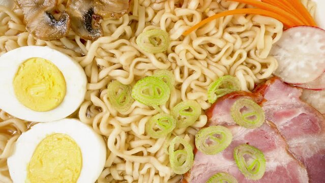 Ramen. Wheat noodles broth, view from above.