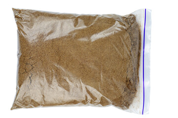 Flax flour in plastic bag isolated on a white background